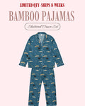 A two-piece bamboo pajama set with a blue base and a repeating pattern of ships, sailboats, and anchors, displayed on a light pink background with promotional text.