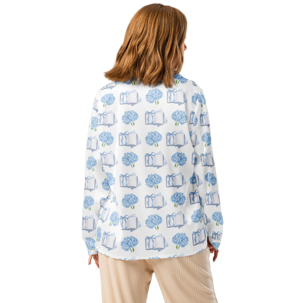Product mockup of back of pajamas that have books and hydrangeas