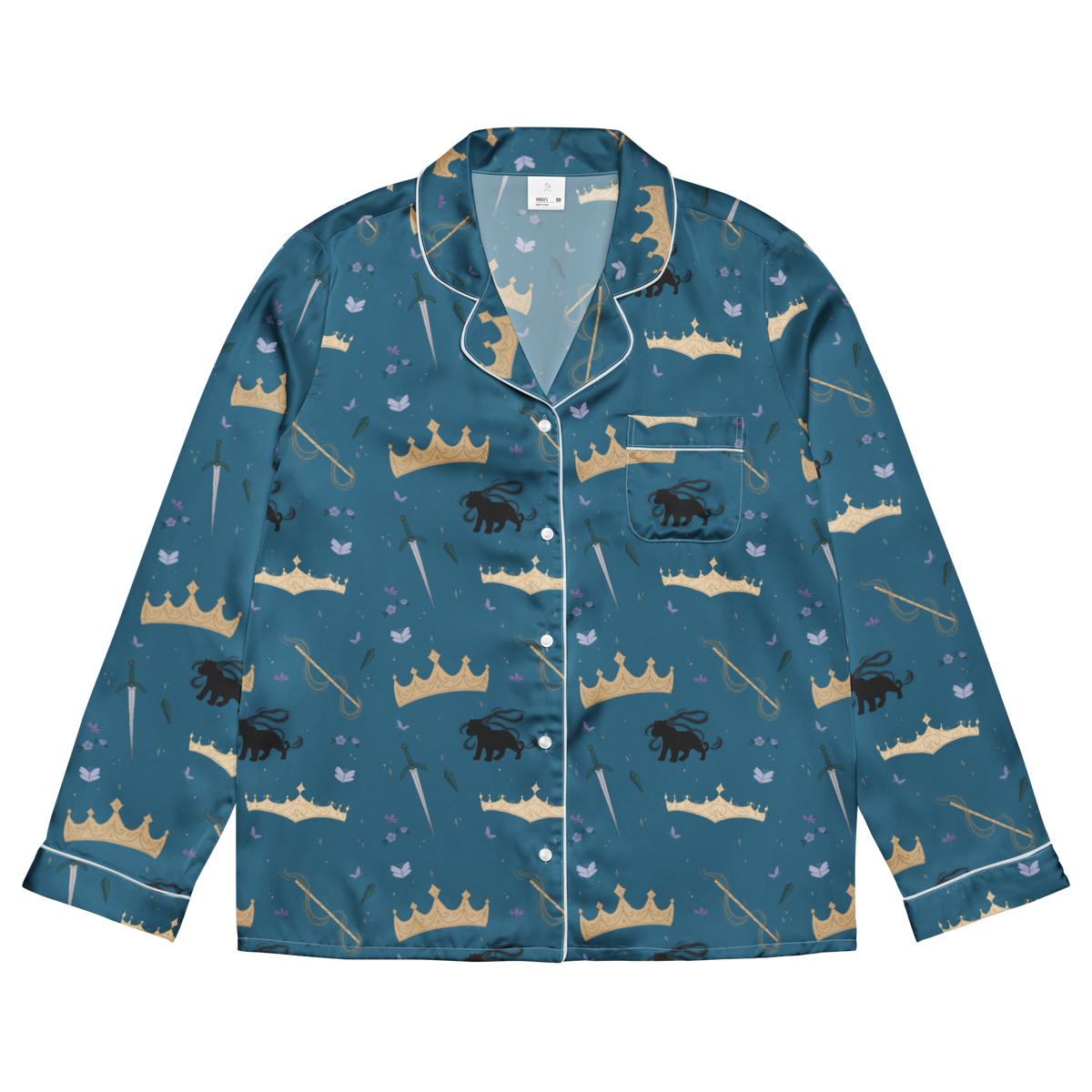 A long-sleeve pajama shirt with a teal blue base, featuring an all-over print of gold and beige crowns, black lions, and small light blue birds. It has white piping along the collar, cuffs, and front placket, and is displayed flat against a solid white background.