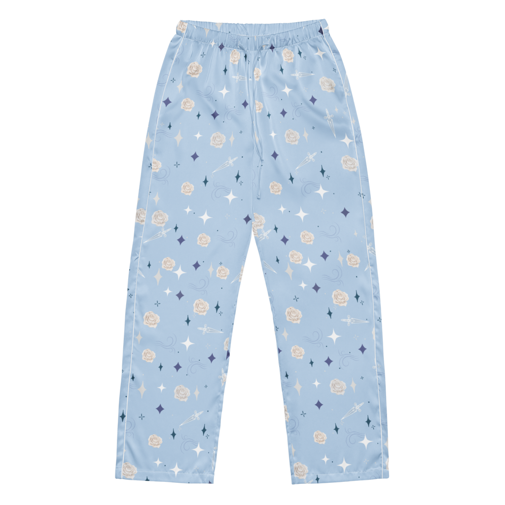 Light blue pajama pants with an all-over whimsical print of fairies, stars, sparkles, and small flowers, shown flat against a solid white background.