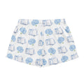 Product mockup of shorts with books and flowers
