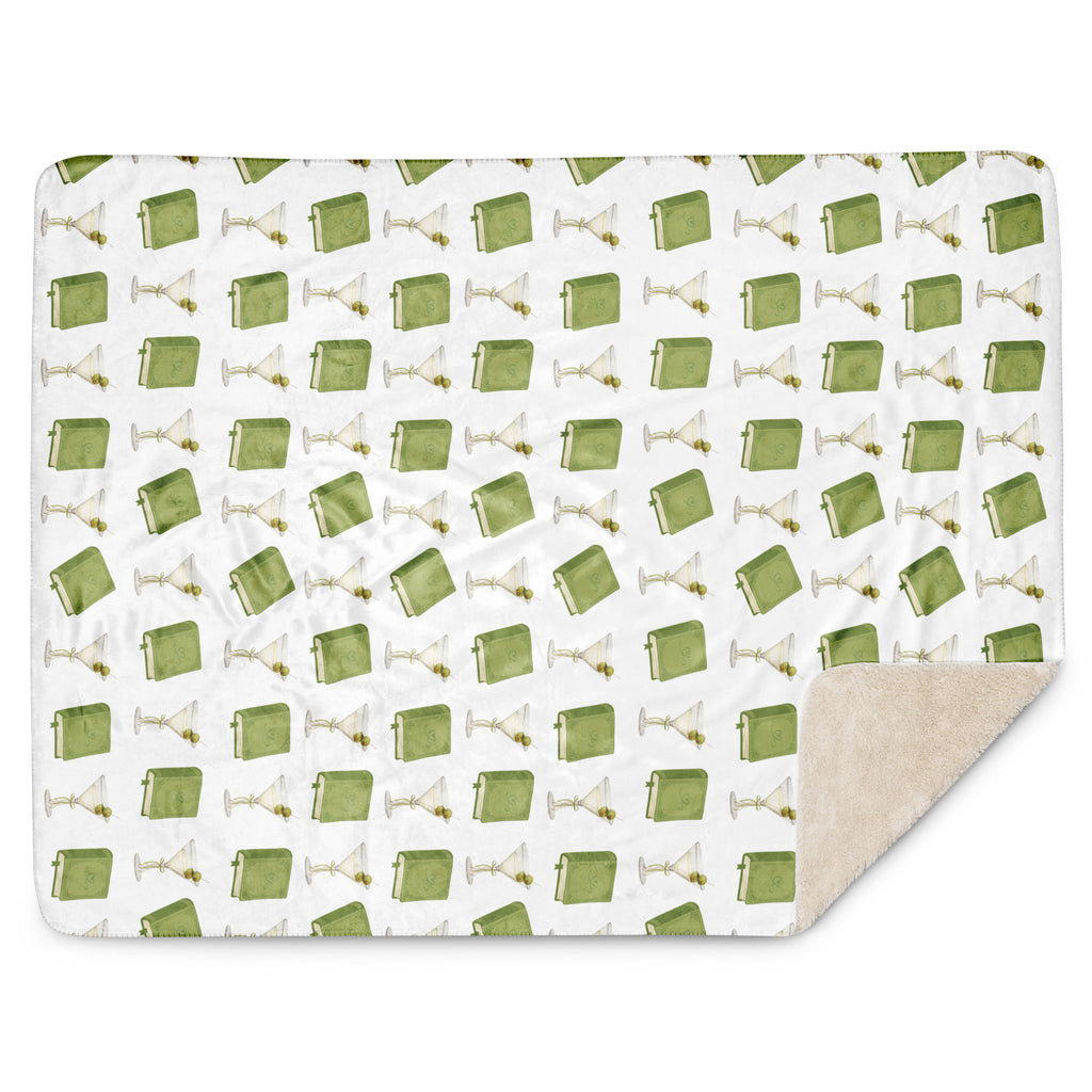 sherpa lined blanket with dirty martinis and green books on it , product mock-up image