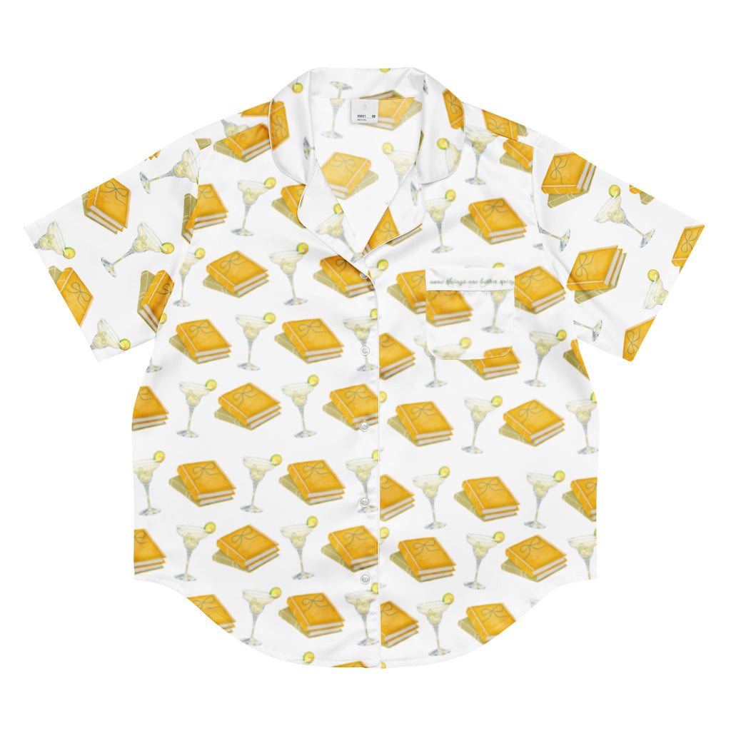 short sleeve pajama top with spicy margaritas and books on it. Pocket says "Some things are better spicy" . Product mock-up image