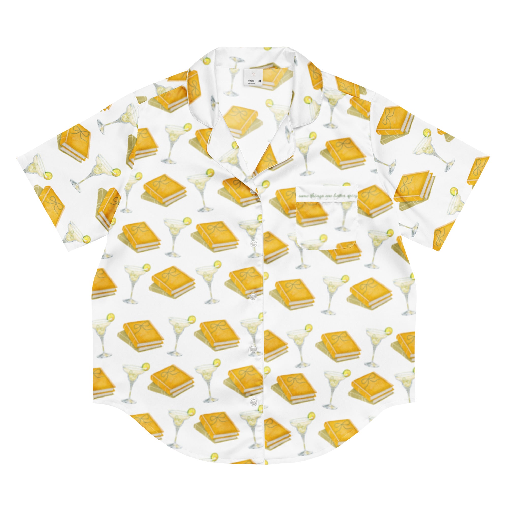 short sleeve pajama top with spicy margaritas and books on it. Pocket says "Some things are better spicy" . Product mock-up image