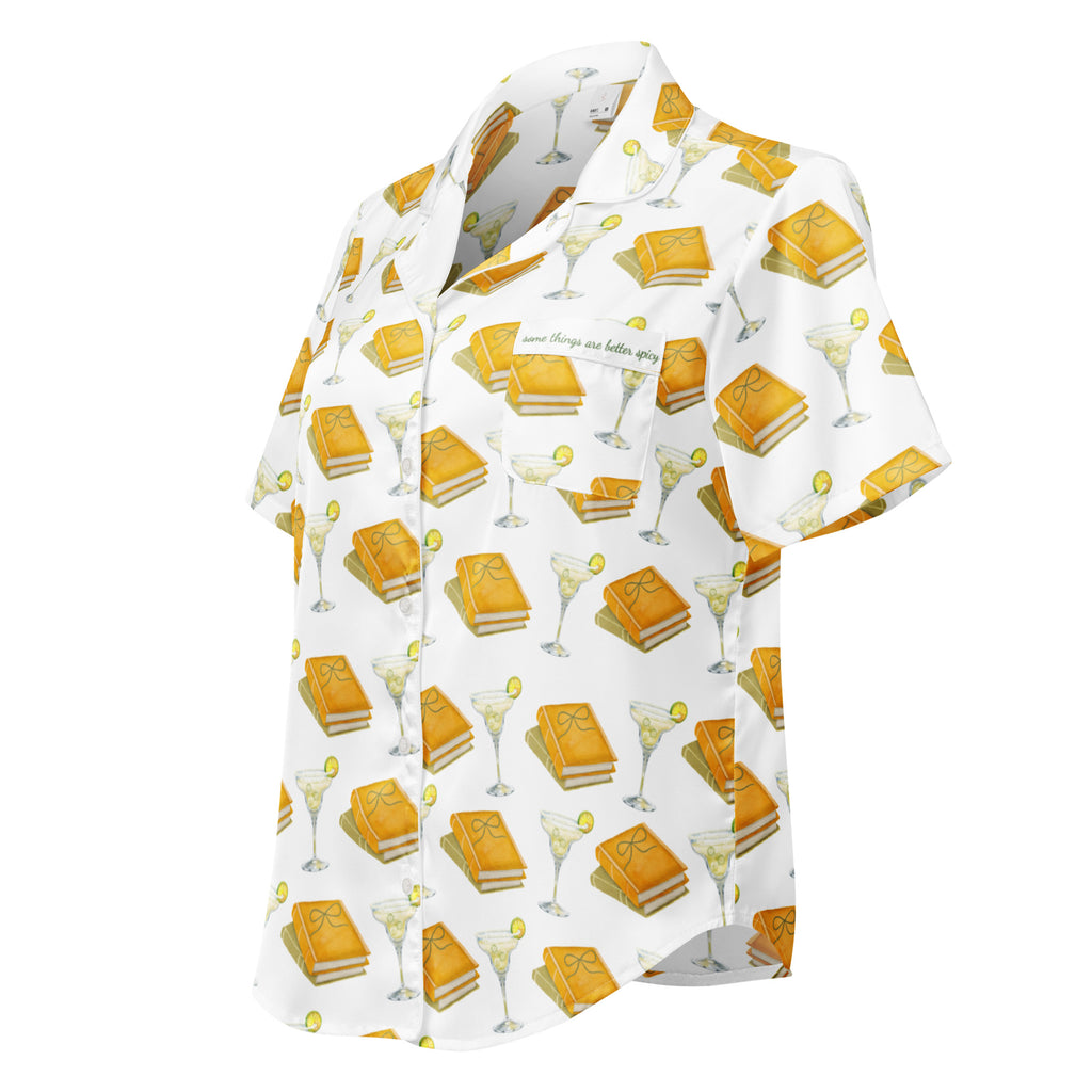 short sleeve pajama top with spicy margaritas and books on it. Pocket says "Some things are better spicy" . Product mock-up image