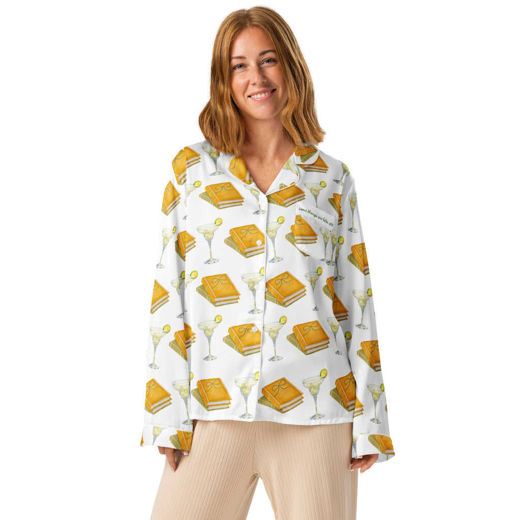 woman wearing long sleeve pajama top with spicy margaritas and books on it. Pocket says "Some things are better spicy" . Product mock-up image