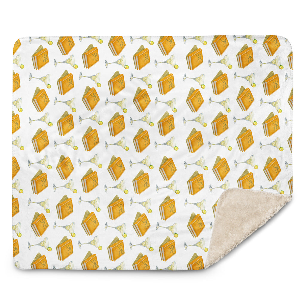 sherpa lined blanket with spicy margaritas and books, product mock-up image