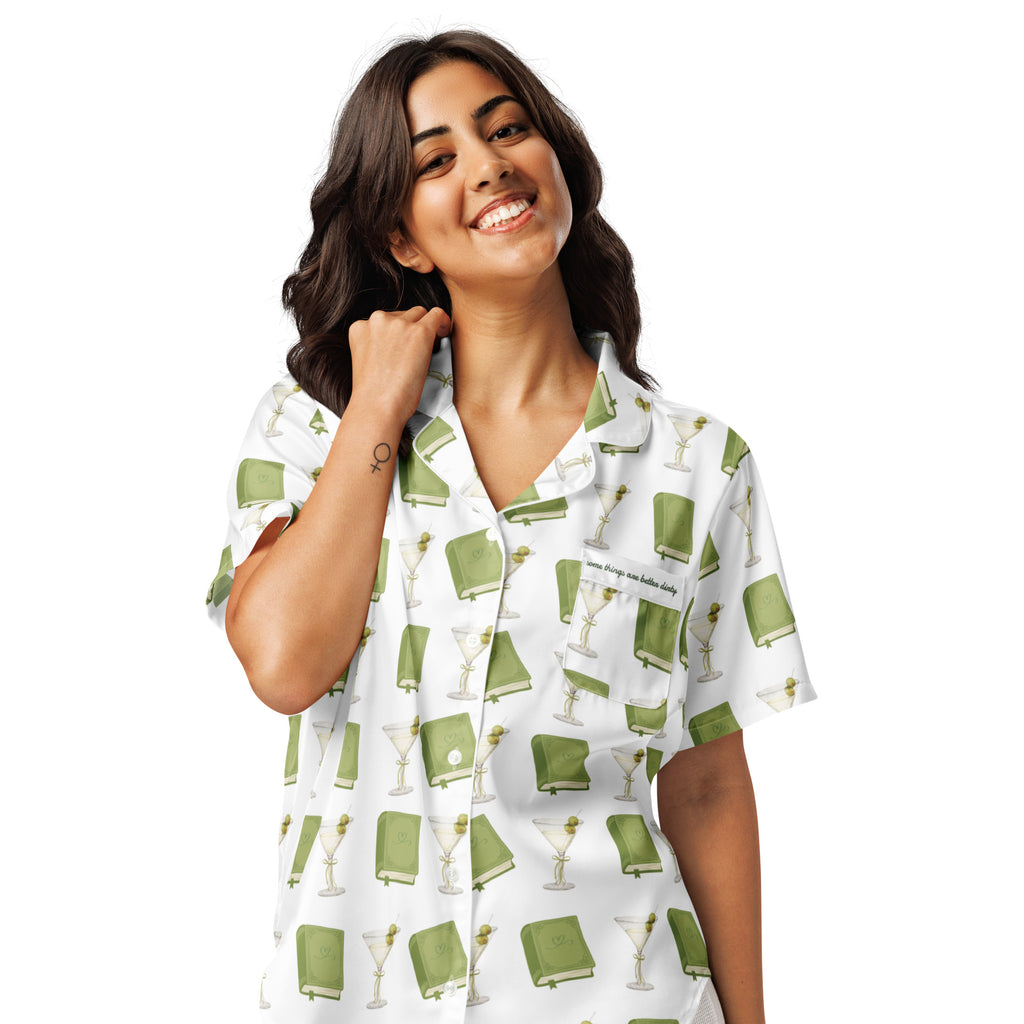 woman in short sleeve pajama top with dirty martini and books on it. Pocket says "Some things are better dirty" . Product mock-up image