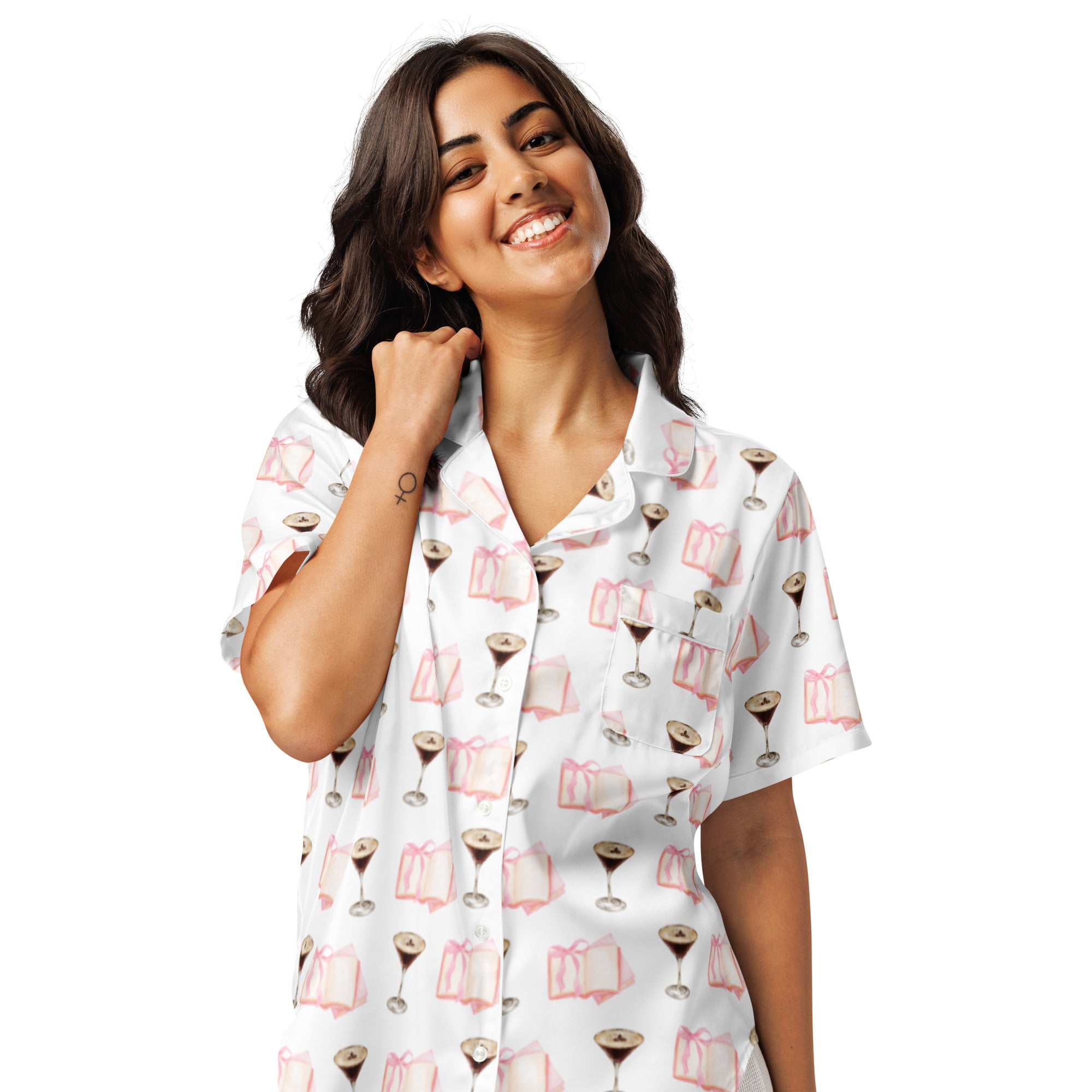 woman wearing espresso martini and pink books on a short sleeve pajama top product mock-up
